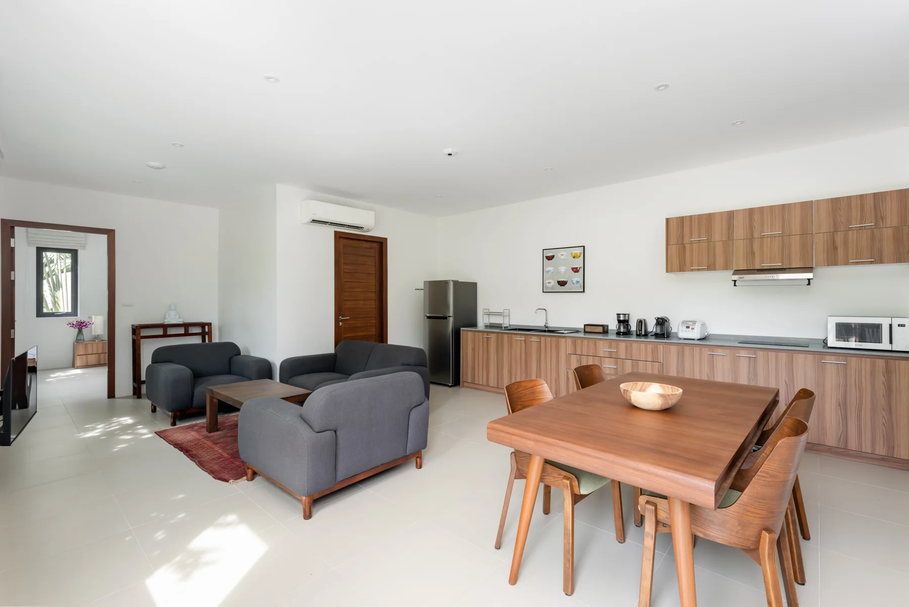 The apartment’s open-plan living and dining space